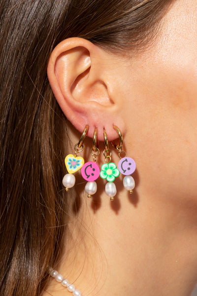 Lilac smiley - This earring brightens up your day! Wear it on it’s own to keep it simple or create your perfect ear party. More is more and less is bore.