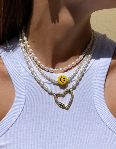Luna necklace - Our favorite necklace at this moment. It’s a statement piece on it’s own but also nice to stack it up. Pearls, gold and hearts, what’s not to love?