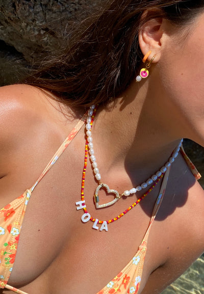 Hola necklace - Let's get Spanish! Wear this necklace to spice up your bikini or a simple t-shirt or sweater. The necklace is perfect to layer with other necklaces.